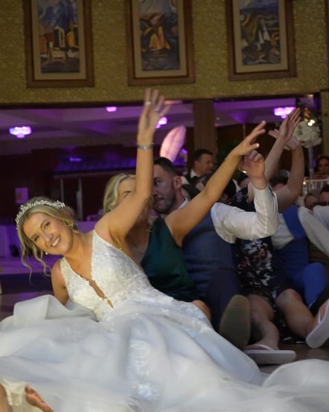 A bride on the dance floor with her guests at An Grianan Hotel