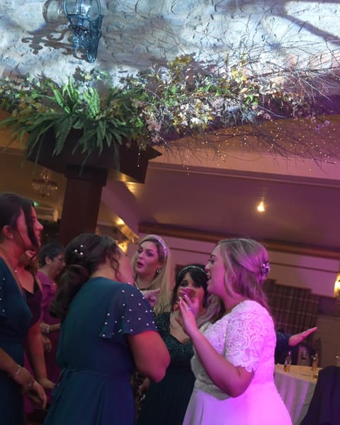 A bride dancing with her guests at Darver Castle