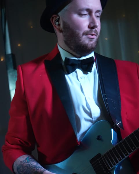 The guitarist in a red jacket at the Four Seasons Hotel, Monaghan