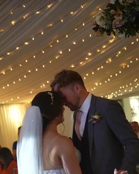 A bride and groom sharing a kiss at Killeavy Castle