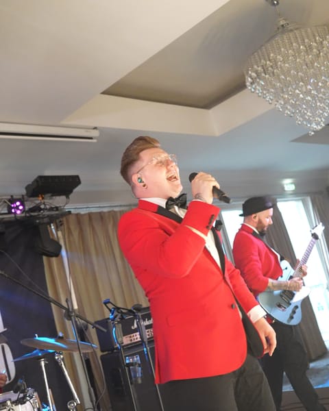 Adam and the band on stage at Millbrook Lodge