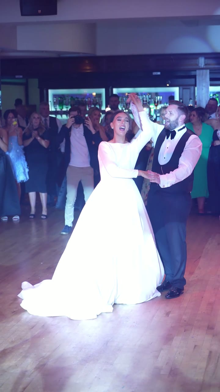 A bride twirled by her groom on their first dance at Canal Court